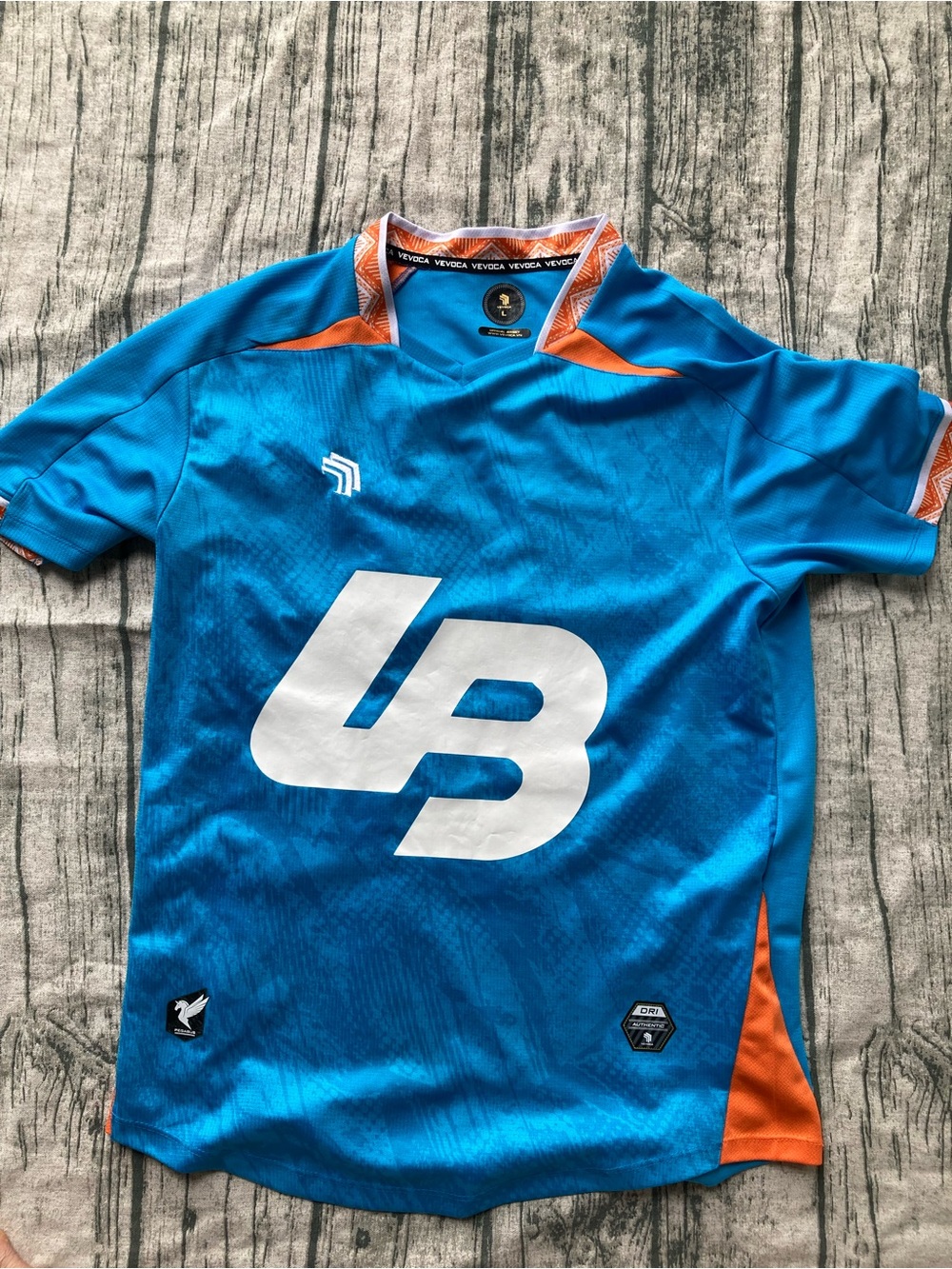 Blue Athletic Jersey with Orange Accents